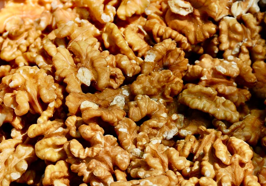 Delicious close-up of walnut halves highlighting texture, perfect for healthy eating content.